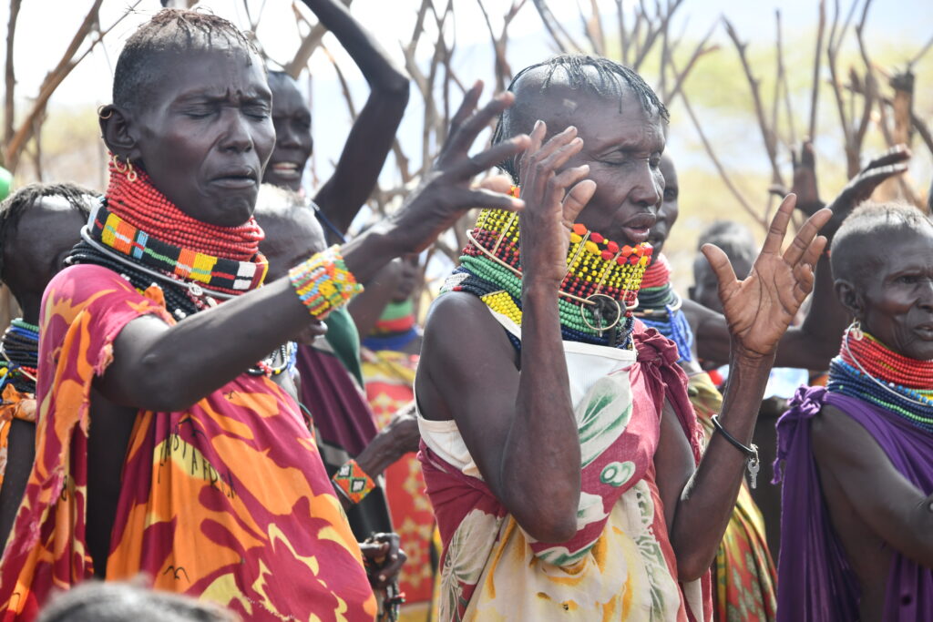 Women and pray for the rains in Kopeto village after a long dry spell